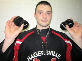 MONTE SONNENBERG Simcoe Reformer
Derek Medeiros of the Hagersville Hawks notched four goals and four assists in an 11-2 drubbing of the Delhi Travellers Saturday night. By virtue of the outburst, the Cayuga native solidified his grip on the SOJHL scoring title for 2012-2013.