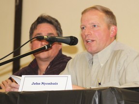 John Nyenhuis, a Sebringville-area farmer, tells his story about his experience with the OSPCA to close to 300 people in Brussels at a meeting organized by the Ontario Landowners’ Association.