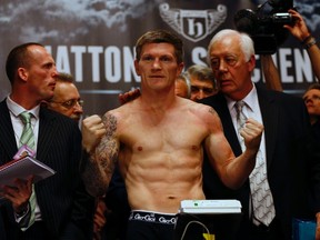 British boxer Ricky Hatton stands on the scales during a weigh-in, ahead of his comeback fight against Vyacheslav Senchenko of Ukraine, at the Town Hall in Manchester, northern England, November 23, 2012. (REUTERS/Darren Staples)