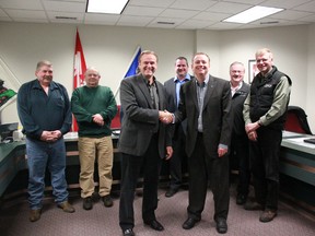 Rob Merrifield, centre-left, presented Jim Rennie, beside, and Woodlands County council with $56,000 from the Community Infrastructure Improvement Fund, which will be used to improve recreation sites around the county. 
Carla Howell | Whitecourt Star