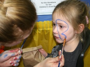 Facial artist Jelissa Klassen (left) paints a blue butterfly on Olivia Heleniak’s face Saturday morning during the 18th Annual Alzheimer Society of Oxford’s Walk For Memories inside the Lion’s Auditorium. The event attracted a full house of participants, ranging in age from young children to those in their 90s. It, along with events in Ingersoll and Woodstock, are per capita, by the most successful in Ontario says Executive Director Shelley Green. Jeff Tribe/Tillsonburg News