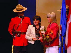 Strathcona County mayor Linda Osinchuk presents the Pride of Strathcona Mayor’s Award to former MLA Iris Evans last year. File Photo