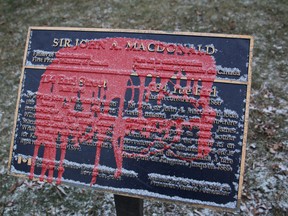 After defacing the statue of Sir John A. Macdonald on Jan. 11, vandals painted a plaque about Canada's first prime minister at 134 Earl St., as well as another on Johnson Street.
Michael Lea The Whig-Standard