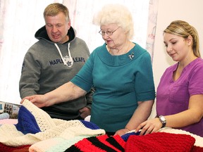 The children of  Timmins and District Hospital’s pediatric wing will be a little more snug in their beds during this cold winter thanks to a generous donation from Shirley Richens. Richens donated 20 crocheted blankets to the pediatrics ward on Sunday, just another in a long line of selfless acts for the hospital. In attendance for the donation were, from left, Dr. Richard Kvas, Richens and registered nurse Ashley Cheff.