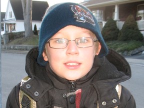 SARAH DOKTOR Simcoe Reformer
Austin Kauzen-McMurphy bundled up on his walk home from Elgin Avenue Public School on Tuesday. Norfolk County residents were urged to use caution as temperatures dropped to -13 Celsius.