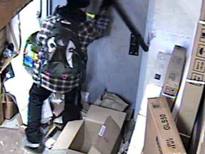 Supplied photo
The suspect of a break and enter is described as wearing black pants with a plaid-patterned jacket and backpack.