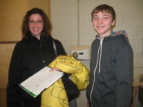 Jennifer Kovacs and her son Nick, an Emily Stowe Public School student, toured the woodwork room at Delhi District Secondary School on during a Grade 8 information night on Jan. 15. (SARAH DOKTOR Delhi News-Record)