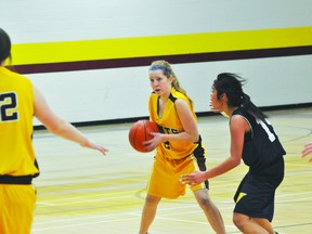 Saints' Mackenzie Brydges looks for a pass during a game earlier in the year. (Kevin Hirschfield/Portage Daily Graphic/QMI AGENCY