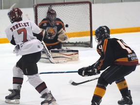 Cornerstone Builders Quinte Major Peewees' Nathan Dunkley takes a shot at the Barrie Colts net during the Devils' 5-1 win Sunday.