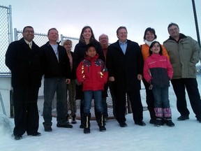 Edmonton-Leduc MP James Rajotte (centre) stands with members of the Greenfield community in front of the Greenfield Rink, which received a $42,400 federal grant. Kevin Maimann Edmonton Examiner