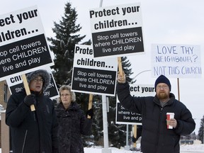 A group of protesters, including Greenfield residents, protested the installation of a Rogers cell tower on the roof of the Dayspring Presbyterian Church in Edmonton Alta., on Sunday Jan. 13, 2013. IAN KUCERAK QMI Agency