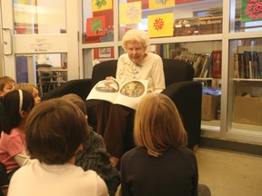 Elsie Dandy, 95, reads to children at Nose Creek Elementary School. Dandy volunteers at the school every Tuesday, Wednesday and Friday morning, helping out the teachers and interacting with the students. She also volunteers at the Airdrie Health Centre and the Bethany Care Centre.