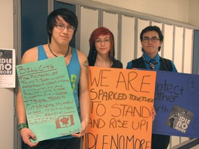 Bert Church High School students Warren Big Bull (left), Page Nahanni, and Christian Welch helped organize an Idle No More protest Thursday.