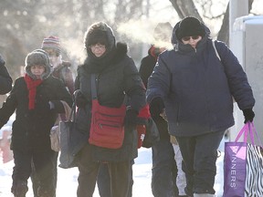 People bundle up in the cold.