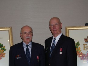 Larry Chorney and Gary Sky after being presented with their Diamond Jubilee medals by Lt. Governor Donald S. Ethell Jan. 18.