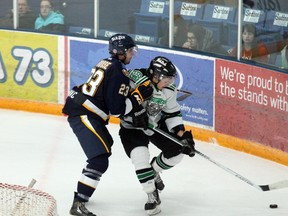 Jordan Thompson/Today file photo
Oil Barons defenceman Sam House lays a hit on Drayton Valley Thunder forward Frederic Tanguay during the last meeting between the two teams on December 15. The Thunder will host the Barons tonight.