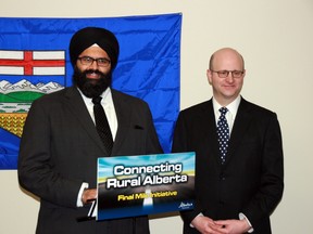 Former Service Alberta Minister Manmeet Bhullar, joined by Fort McMurray-Conklin MLA Don Scott, announces plans to provide improved high-speed Internet to rural residents throughout Alberta in this 2013 file photo. Vincent McDermott/Today staff