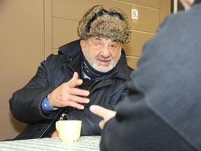 Albert "Rocky" Denargo, a client of the Elgin Street Mission, chats with Pastor Rene Soulliere in this January 2013 file photo. GINO DONATO/THE SUDBURY STAR