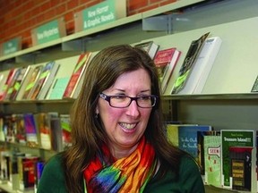 Deanna MacDonald, Kingston Frontenac Public Libraries programming and outreach librarian, is hoping that many residents will stay warm this winter as they curl up with a good book.      Rob Mooy - Kingston This Week
