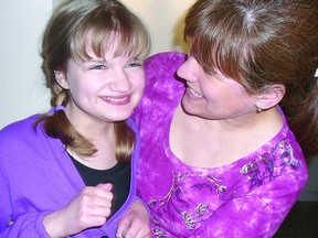 Abby Congram, 13, and mom Karen share a smile recently. (Contributed photo)