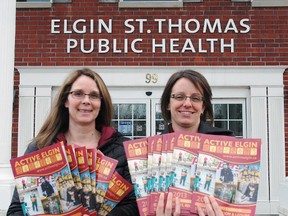 Elgin-St. Thomas Public Health nurse Pam Ewart, left, and health promoter Erica Arnett with copies of the 2013 Active Elgin Guide. The guide is being distributed to thousands of households today with activity listings for things like sports, art and music classes and other recreational activities. (Nick Lypaczewski, Times-Journal)