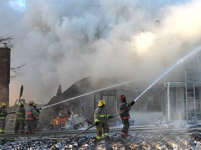 Firefighters from Loyalist and Stone Mills fire departments battled a house fire on Fred Brown Road, north of Odessa, in bitter cold Thursday morning. No one was home at the time of the blaze as the house was under construction.
Michael Lea The Whig-Standard