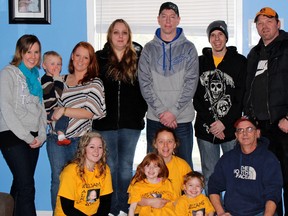 Laura Eaton, back left, Ashley Taylor and her son Ethan, Melissa Blackmore, Keith Cowgill, Ken Robinson, Mark Blackmore, Tanya Quackenbush, front left, Shannon Robinson and her children Karissa and Andrew, Frank Norman and Kody Blackmore (not pictured) are competing as a floor hockey team in the Maple Leaf Sports Entertainment Camp Trillium Team Up Challenge on June 23, 2013 in memory of Melissa's son, William. William passed away because of cancer at age 2. SUBMITTED PHOTO