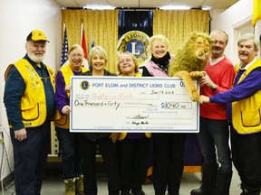Pictured (left to right) Doug Earle, Peggy Buckton, Joanne Wheeler, of Pretty in Pink, Mary Heimbecker, Sylvia Sheard of Pretty in Pink, Leo the Lion, pretty boy Tony Sheard and Ed Buckles.