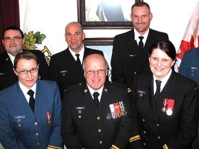Local Canadian Forces personnel were awarded the Queen's Diamond Jubilee Medal on Thursday, Jan. 24, 2013 during a ceremony at the Chatham Armoury, in Chatham, Ont. Pictured from front, left, are: Lt. Victoria Eskritt with the 291 RCACS Blenheim, Major Lloyd Sainsbury, Regional Cadet Support Unit Central Detachment London, who presented the medals, SLt. Kathryn Bandia 162RCSCC Wallaceburg. Back row from left: Capt Sean Ewasyke, 2828 RCACC Windsor, Lt (N) Jeffery Brewer, 162 RCSCC Wallaceburg, Robert Doiron Lt (N) HMCS Ontario Windsor and Lt. Chris Russell 294 RCACS Chatham.
ELLWOOD SHREVE/ THE CHATHAM DAILY NEWS/ QMI AGENCY