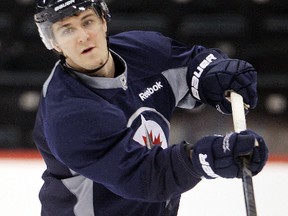 Jets forward Mark Scheifele fires a shot during a skate in Winnipeg, Man., Jan. 12, 2013. (BRIAN DONOGH/QMI Agency)