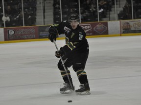Terriers defenceman Tyler Harland makes a pass.