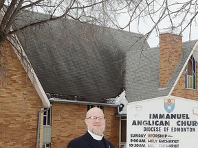 Rev. Hugh Matheson poses outside the Immanuel Anglican Church, 5013 46 Ave., in Wetaskiwin. He is the new pastor of the church, where about 80 families attend services twice on Sunday.