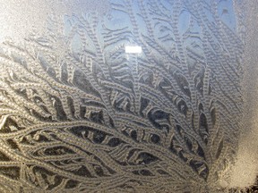Photo posted to the T-J's Facebook page, Anette Orchard's photo of a frosty filigree Tuesday morning on the window of her Grand Central apartment is warming viewers' hearts. Anette Orchard/Contributed