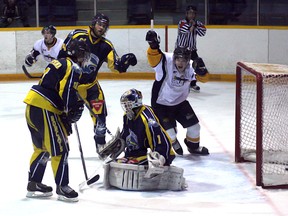 Kirkland Lake's Alex Perrault celebrates a goal scored by teammate Joey Ftoma during the Miners' 5-2 win over Elliot Lake Friday night at The Joe.