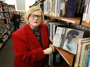 Cindy Weir, the chief librarian at the Owen Sound & North Grey Union Public Library, with some books in the library’s extensive poetry collection.