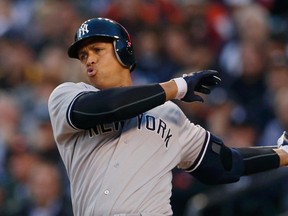 New York Yankees Alex Rodriguez swings through a pitch during the sixth inning of Game 4 of their MLB ALCS baseball playoff series against the Detroit Tigers in Detroit, Michigan, October 18, 2012. (REUTERS)