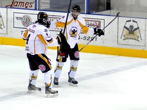 The Abitibi Eskimos triumphed over the Elliot Lake Bobcats 5-3 on Saturday night at the Jus Jordan Arena, grabbing their first win of 2013. Eskimos forward Zach Innes, right, celebrates with captain Kevin Walker following scoring the game-winning-goal in the third period. Innes added an empty net goal with 11 seconds left in the contest.