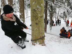 Wesley Stanyer, 15, of the First Walkerton Scout Troop, works to pull his team's sled up a hill during the annual Rescue Race at the 50th Annual Sunset Area Winter Camp on Saturday January 26, 2013 at Harrison Park in Owen Sound. Troop members had to pull the sled and its injured passenger up a hill using ropes and manpower. It was was one of the six events in the Rescue Race activity that tested the scout's survival and first aid skills.