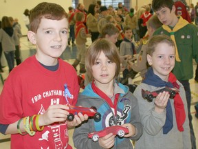 Brendan Peters, 10, Eric Dodman, 9, both of 19th Chatham Cubs, and Mark Debevc, 7, of 4th Chatham Cubs, were among the participants at the annual Kub Kar rally held at the WISH Centre.