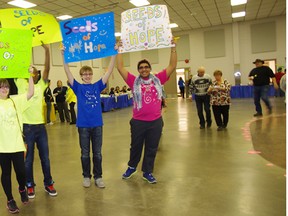 Members of the Woodstock Youth Empowerment Project took part in Alzheimer Society Walk for Memories held at the Oxford Auditorium on Saturday, January 26. From left Sabrina Vincze, Roje Anderson, Josh Vincze and Chayan Dehghan. (HEATHER RIVERS, Woodstock Sentinel-Review)