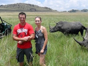 Internet photo

Chantal Beyer and her boyfriend pose for a photograph with two white rhinos moments before they were charged.