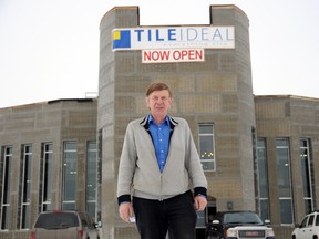 Ingo Helmrich, owner of Tile Ideal, stands out front of the new warehouse located at 10330 117 Avenue. The family business – formerly known as Ideal Ceramic & Floors on 102 Avenue– recently moved to the new location and officially opened on Jan. 16. (Patrick Callan/Daily Herald-Tribune)