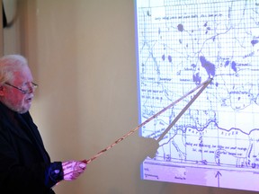 Historian Dr. David Leonard hosts a lecture Saturday at the Grande Prairie Museum. His lecture focused on Grande Prairie’s history, more specifically how, and why, the city grew in the early days of settlement. (Aaron Hinks/Daily Herald-Tribune)