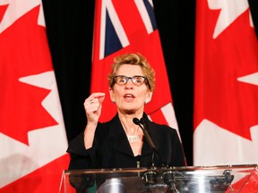 Ontario’s premier-designate, Kathleen Wynne, holds a news after winning the leadership in Toronto. (Michael Peake QMI Agency)