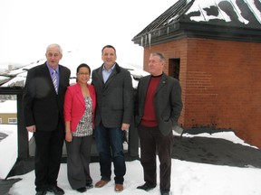 Kenora MP Greg Rickford (second from right) announced $200,000 to fund a replacement roof for City Hall on Monday. From left, Mayor Dave Canfield, Coun. Charito Drinkwalter, Rickford and Coun. Ron Lunny. 
JON THOMPSON/Daily Miner and News