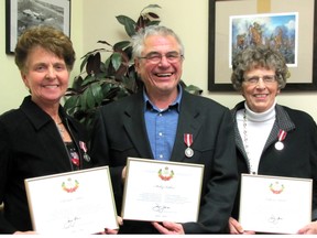 Three Mayerthorpe citizens; from left; Charlotte Arthur. Mickey Krikun and Kate Patrick show the medals and certificates they were presented by Mayor Kim Connell at the Mayerthorpe council policies and priorities meeting on Monday, Jan. 22.