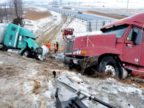 Queen's line  at 401 overpass west of Chatham is closed while transports are being moved after a collision on 401 Monday morning. (Diana Martin, Chatham Daily News)