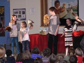 KEVIN RUSHWORTH PHOTO. Children’s author and workshop speaker, Victor Lethbridge travelled to each of the area schools to perform and read from his first book, Little Chief and Mighty Gopher: The Pemmican Frenzy. Pictured above, Lethbridge performs a song that goes along with his book with Livingstone School students.