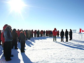QMI CALGARY--Memorial held in Antarctica for three Canadians killed in plane crash last week, three crew members were pilot Bob Heath, Calgarian Mike Denton and a man identified as Perry Andersen. Photo by: Blaise Kuo Tiong, NSF