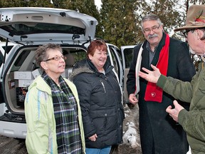 BRIAN THOMPSON, The Expositor

Sharron Martin (left) and Pastor Lorraine Kearsey of The Outpost Ministry on Aberdeen Avenue, and Brant MPP Dave Levac listen as Ross Blaine of Grober Group gives cooking suggestions for some of the meat his company donated on Monday to local organizations who help feed people in need.